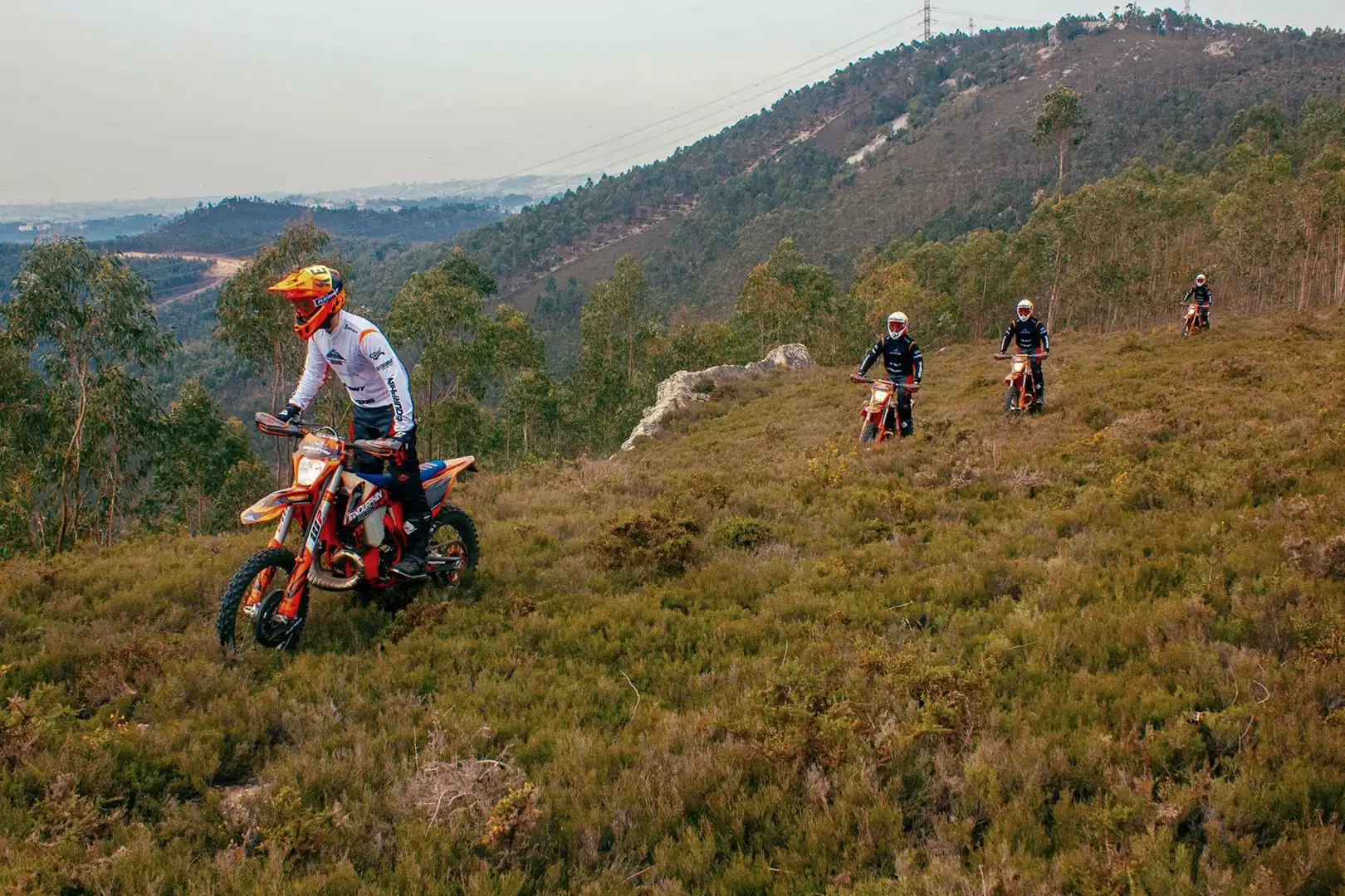 Guided Enduro tour riders in mountain edge of Portugal