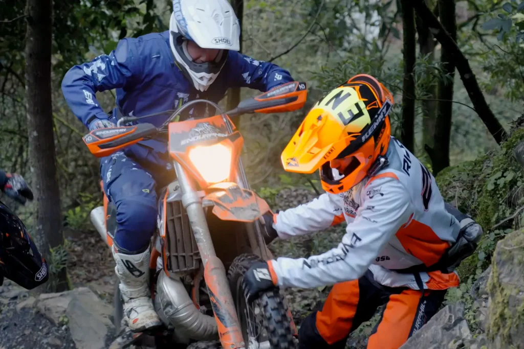 Enduro riders on mountain trails in Serra da Lousã Portugal